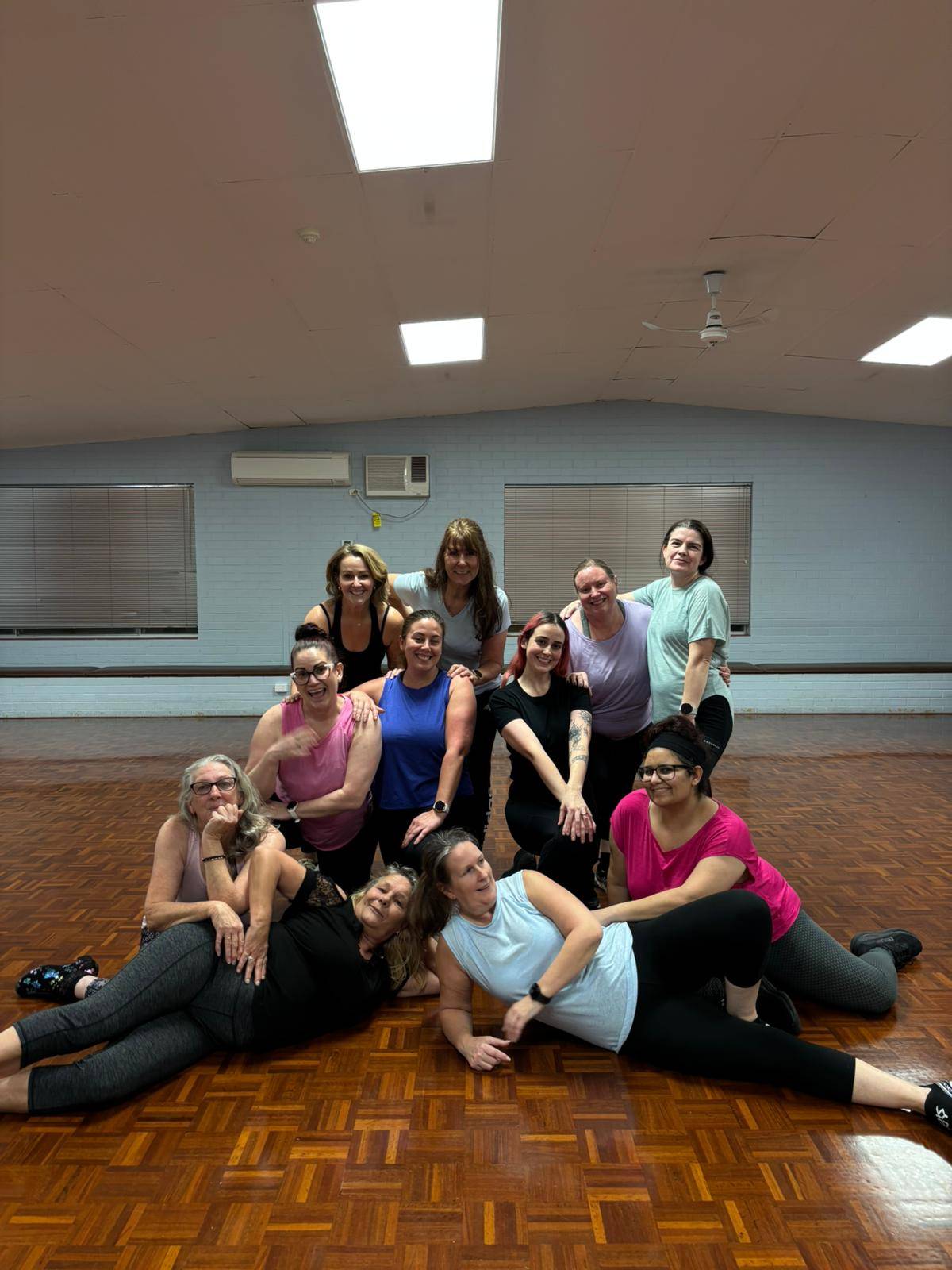 Fierce Motion class members together after dancing
